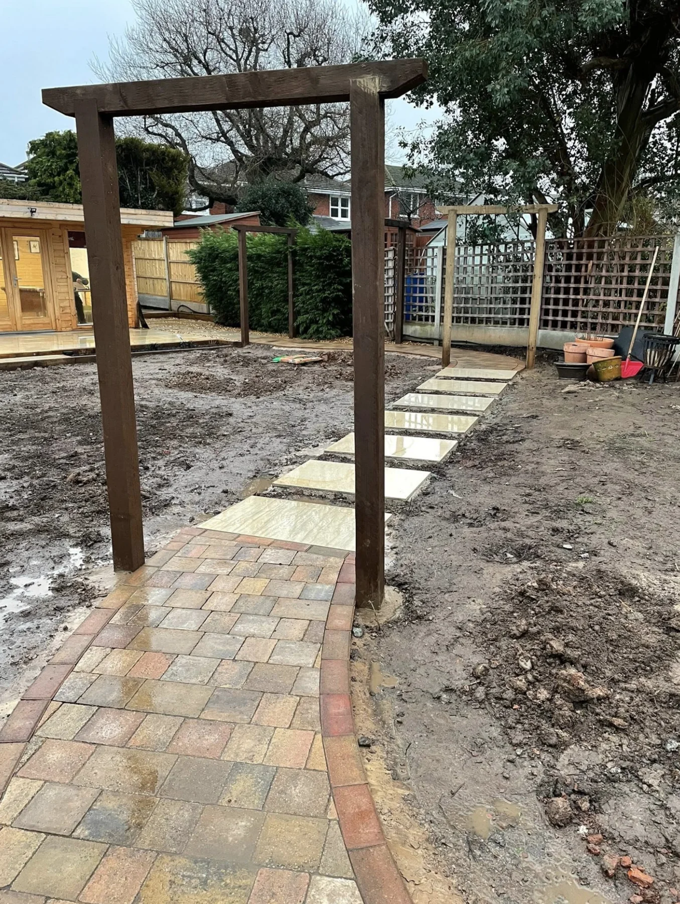Timber pergola and path in a garden transformation